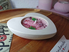 Vela en forma de corazón con aroma a rosas