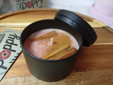 Vela de canela en bote